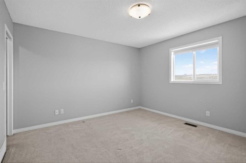 124 Everglen Way Sw, Calgary, AB - Indoor Photo Showing Other Room