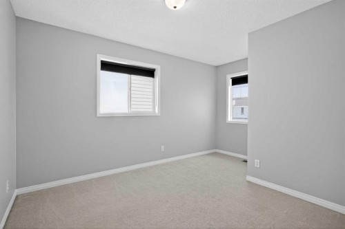 124 Everglen Way Sw, Calgary, AB - Indoor Photo Showing Other Room