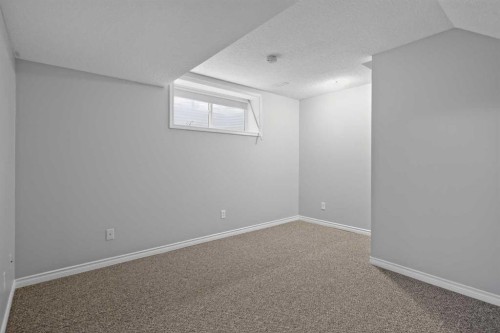 124 Everglen Way Sw, Calgary, AB - Indoor Photo Showing Other Room