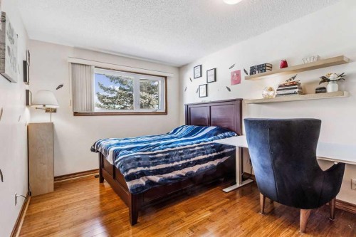 652 Dalmeny Hill Nw, Calgary, AB - Indoor Photo Showing Bedroom