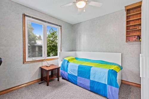 652 Dalmeny Hill Nw, Calgary, AB - Indoor Photo Showing Bedroom
