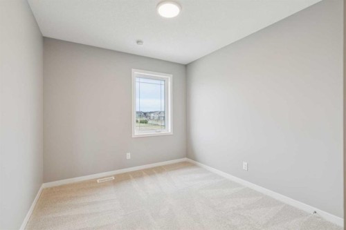 75 Hotchkiss Way Se, Calgary, AB - Indoor Photo Showing Other Room