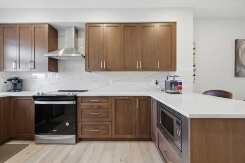 11 Les Jardins Park Se, Calgary, AB - Indoor Photo Showing Kitchen