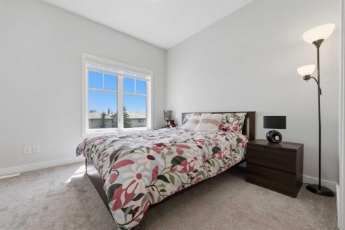 11 Les Jardins Park Se, Calgary, AB - Indoor Photo Showing Bedroom