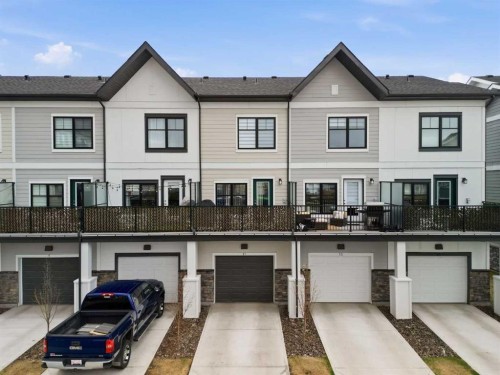 11 Les Jardins Park Se, Calgary, AB - Outdoor With Facade