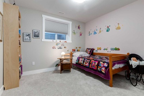 17 Westlynn Drive, Claresholm, AB - Indoor Photo Showing Bedroom
