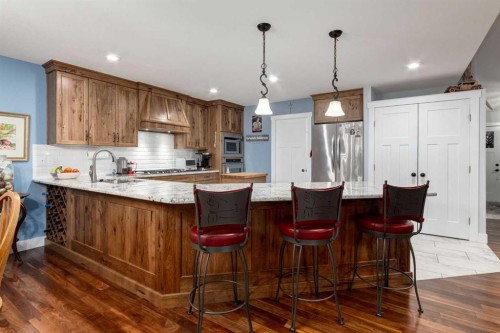 17 Westlynn Drive, Claresholm, AB - Indoor Photo Showing Kitchen With Upgraded Kitchen