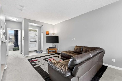 1540 Cornerstone Boulevard Ne, Calgary, AB - Indoor Photo Showing Living Room With Fireplace