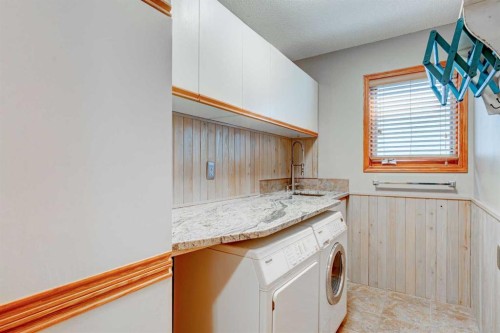 210 Hawkville Close Nw, Calgary, AB - Indoor Photo Showing Laundry Room