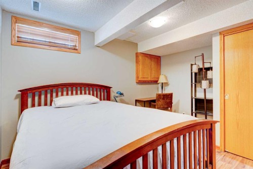 210 Hawkville Close Nw, Calgary, AB - Indoor Photo Showing Bedroom