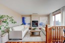 210 Hawkville Close Nw, Calgary, AB  - Indoor Photo Showing Living Room With Fireplace 