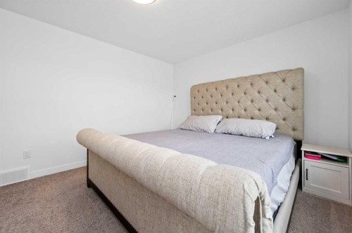 203-33 Merganser Drive, Chestermere, AB - Indoor Photo Showing Bedroom