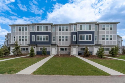 203-33 Merganser Drive, Chestermere, AB - Outdoor With Facade