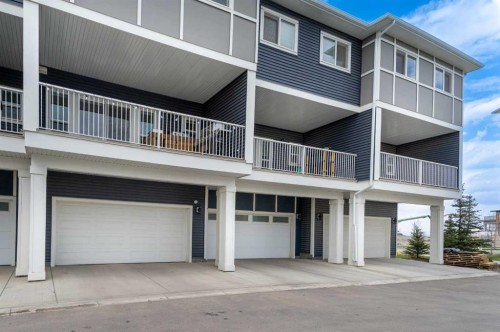 203-33 Merganser Drive, Chestermere, AB - Outdoor With Exterior