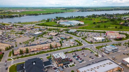 203-33 Merganser Drive, Chestermere, AB - Outdoor With Body Of Water With View