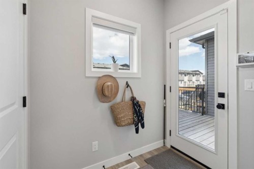 40 Emberside Grove, Cochrane, AB - Indoor Photo Showing Other Room
