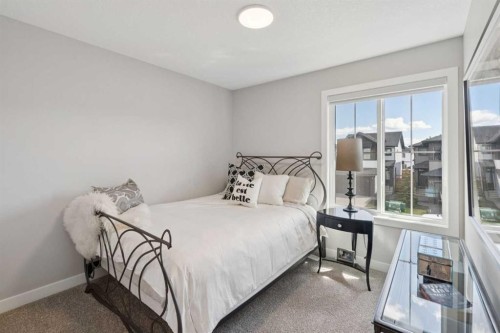 40 Emberside Grove, Cochrane, AB - Indoor Photo Showing Bedroom