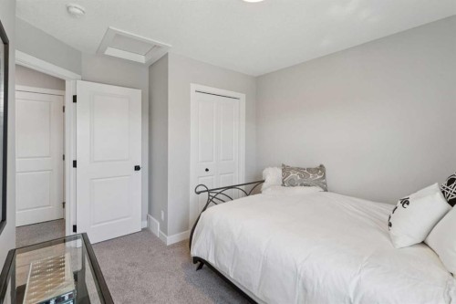 40 Emberside Grove, Cochrane, AB - Indoor Photo Showing Bedroom