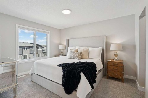 40 Emberside Grove, Cochrane, AB - Indoor Photo Showing Bedroom