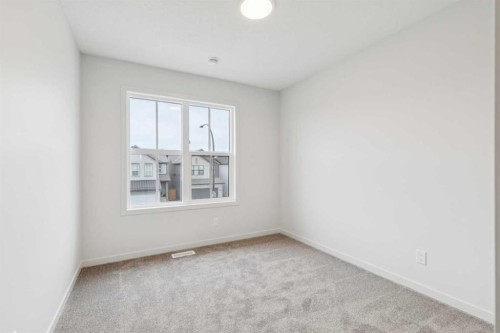 30 Bartlett Row Se, Calgary, AB - Indoor Photo Showing Other Room