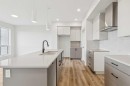 30 Bartlett Row Se, Calgary, AB  - Indoor Photo Showing Kitchen With Double Sink 