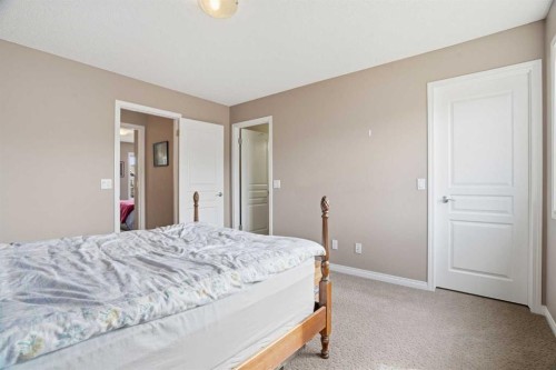 83 Auburn Bay Boulevard Se, Calgary, AB - Indoor Photo Showing Bedroom