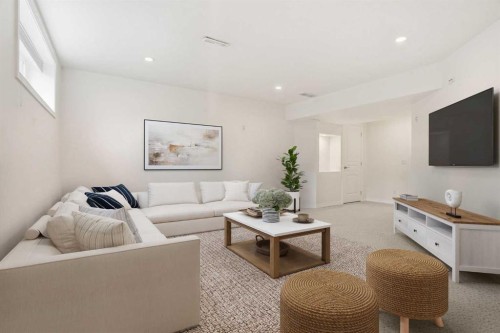 83 Auburn Bay Boulevard Se, Calgary, AB - Indoor Photo Showing Living Room