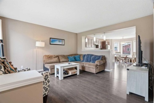 83 Auburn Bay Boulevard Se, Calgary, AB - Indoor Photo Showing Living Room