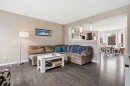 83 Auburn Bay Boulevard Se, Calgary, AB  - Indoor Photo Showing Living Room 