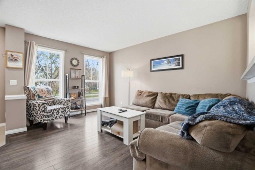 83 Auburn Bay Boulevard Se, Calgary, AB - Indoor Photo Showing Living Room