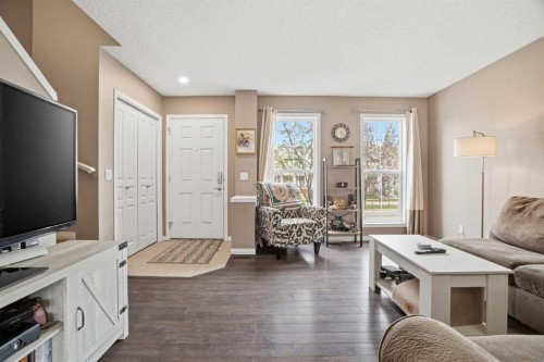 83 Auburn Bay Boulevard Se, Calgary, AB - Indoor Photo Showing Living Room