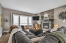 8223 9 Avenue Sw, Calgary, AB  - Indoor Photo Showing Living Room With Fireplace 