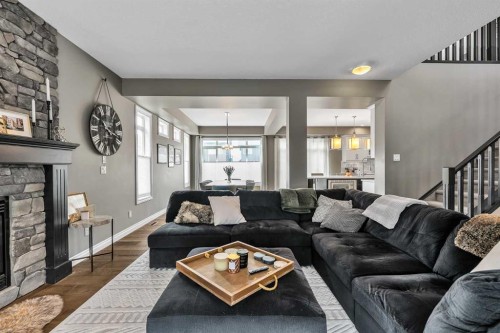8223 9 Avenue Sw, Calgary, AB - Indoor Photo Showing Living Room With Fireplace