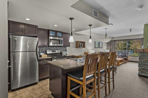 2109-250 2Nd Avenue, Dead Man'S Flats, AB - Indoor Photo Showing Kitchen With Upgraded Kitchen
