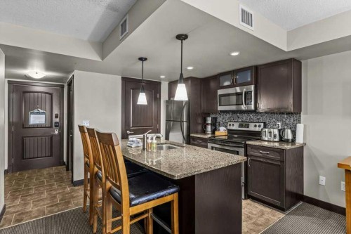 2109-250 2Nd Avenue, Dead Man'S Flats, AB - Indoor Photo Showing Kitchen With Double Sink With Upgraded Kitchen