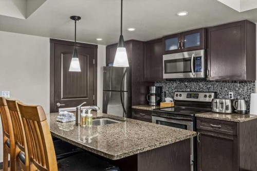 2109-250 2Nd Avenue, Dead Man'S Flats, AB - Indoor Photo Showing Kitchen With Upgraded Kitchen
