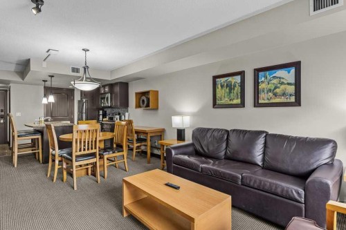 2109-250 2Nd Avenue, Dead Man'S Flats, AB - Indoor Photo Showing Living Room