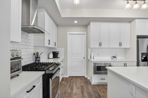 377 Masters Avenue Se, Calgary, AB - Indoor Photo Showing Kitchen With Stainless Steel Kitchen With Upgraded Kitchen