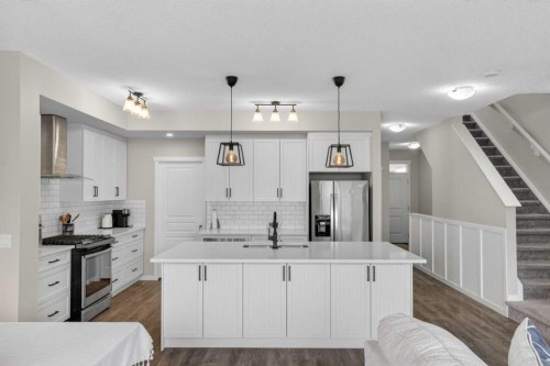 377 Masters Avenue Se, Calgary, AB - Indoor Photo Showing Kitchen With Stainless Steel Kitchen With Upgraded Kitchen