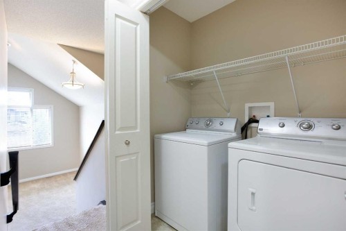606 Montgomery Close Se, High River, AB - Indoor Photo Showing Laundry Room