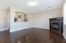 606 Montgomery Close Se, High River, AB  - Indoor With Fireplace 
