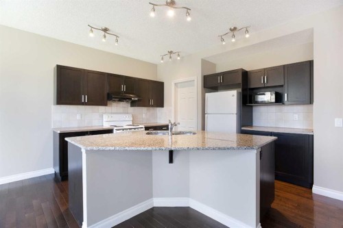 606 Montgomery Close Se, High River, AB - Indoor Photo Showing Kitchen