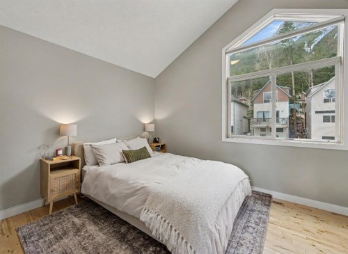 921 Lawrence Grassi Ridge, Canmore, AB - Indoor Photo Showing Bedroom