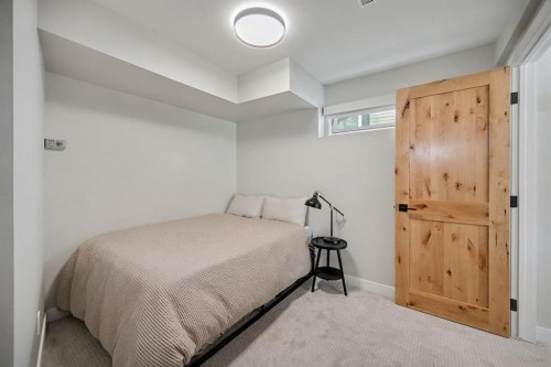 921 Lawrence Grassi Ridge, Canmore, AB - Indoor Photo Showing Bedroom