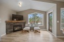 921 Lawrence Grassi Ridge, Canmore, AB  - Indoor Photo Showing Living Room With Fireplace 