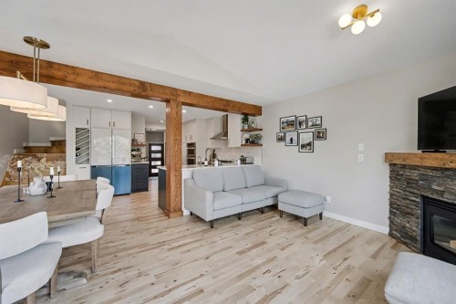 921 Lawrence Grassi Ridge, Canmore, AB - Indoor Photo Showing Living Room With Fireplace