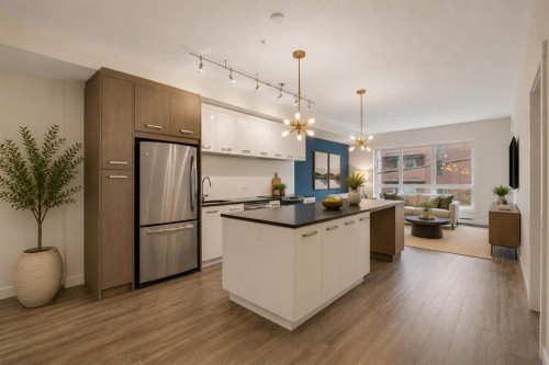 208-811 5 Street Ne, Calgary, AB - Indoor Photo Showing Kitchen With Stainless Steel Kitchen