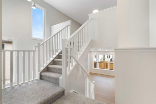 125 Southborough Common, Cochrane, AB - Indoor Photo Showing Other Room