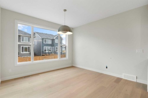 125 Southborough Common, Cochrane, AB - Indoor Photo Showing Other Room