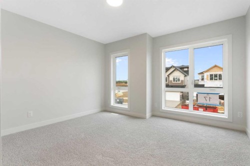 125 Southborough Common, Cochrane, AB - Indoor Photo Showing Other Room